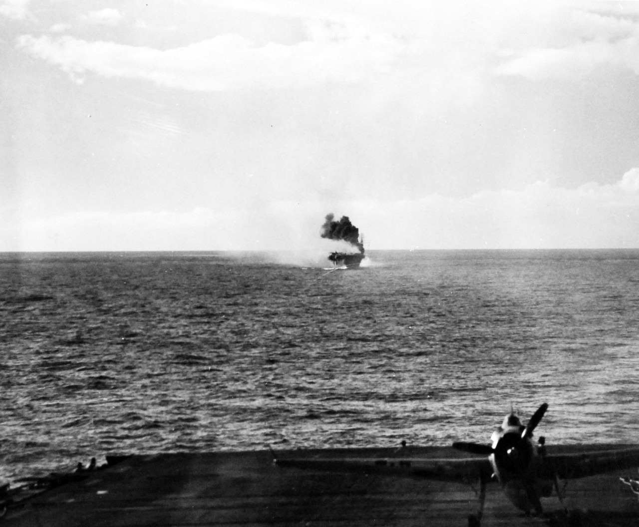 80-G-270626:   USS Suwannee (CVE-27), October 25, 1944.  Fires and explosion on USS Suwannee (CVE-27) resulting from a suicide hit of a Japanese “Zero” near Leyte Gulf, Philippines, taken from USS Sangamon (CVE-25).  Official U.S. Navy photograph, now in the collections of the National Archives.  