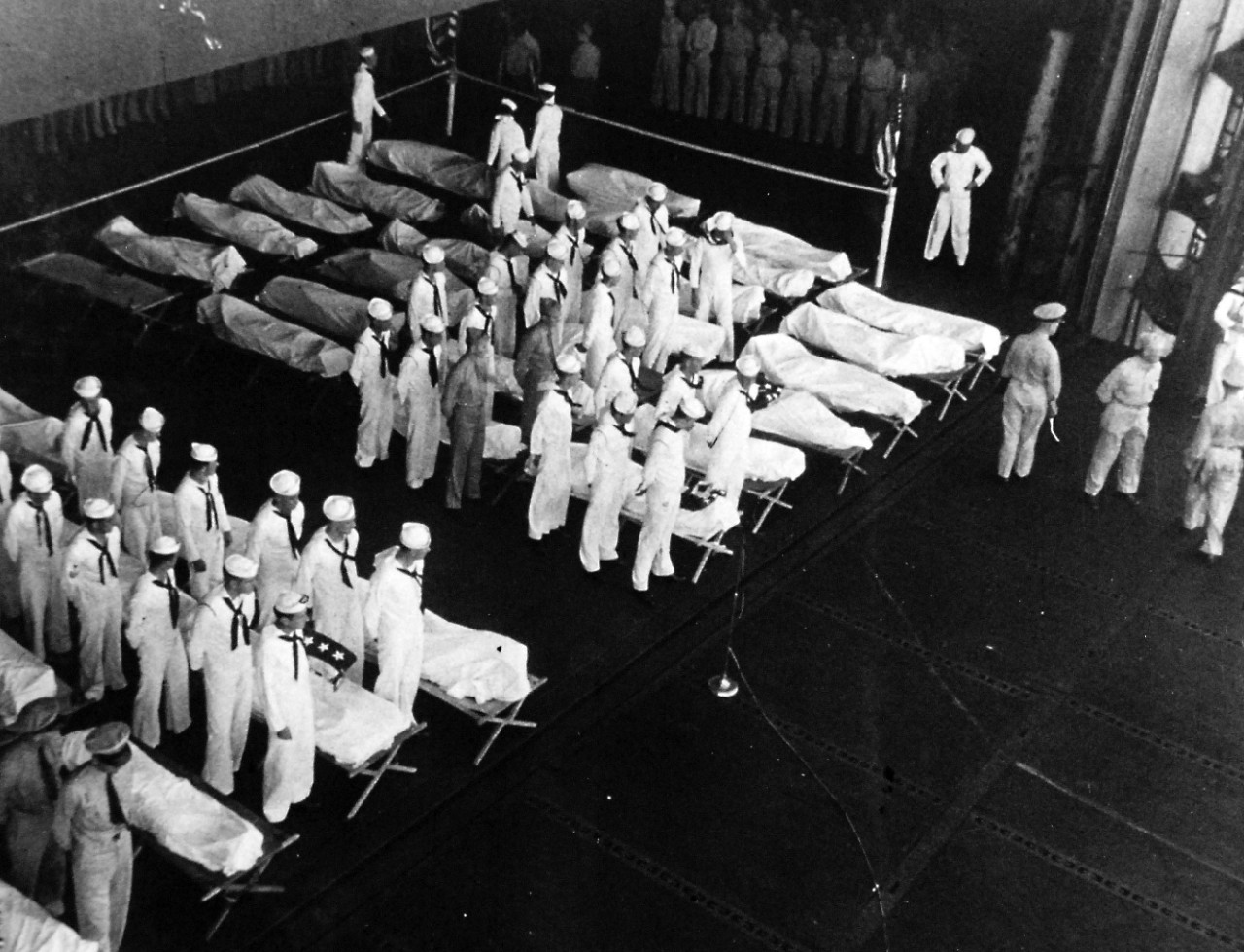 80-G-49693:  Burial at Sea, June 1945.   Navy casualties from a Kamikaze attack on an Essex-class carrier are buried at sea in a moving ceremony.  Released June 28, 1945.   Official U.S. Navy photograph, now in the collections of the National Archives.  