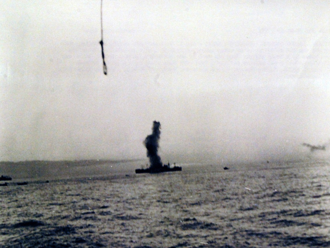 <p>19-LCM-North Africa-1: Naval Battle of Casablanca, November 8-16, 1942. French Morocco, (Casablanca area). U.S. Navy transport USS Edward Rutledge (AP-52), just as she was hit amidships by an enemy submarine torpedo. This remarkable photograph was taken by a naval officer from the deck of the transport USS Hugh L. Scott (AP-43), which had been torpedoed a few minutes earlier. Both were sunk along with a third transport, USS Tasker H. Bliss (AP 42), during the operation in November 1942 off Fedala, about 15 miles north of Casablanca. Photograph released 3 December 1942.&nbsp;</p>

