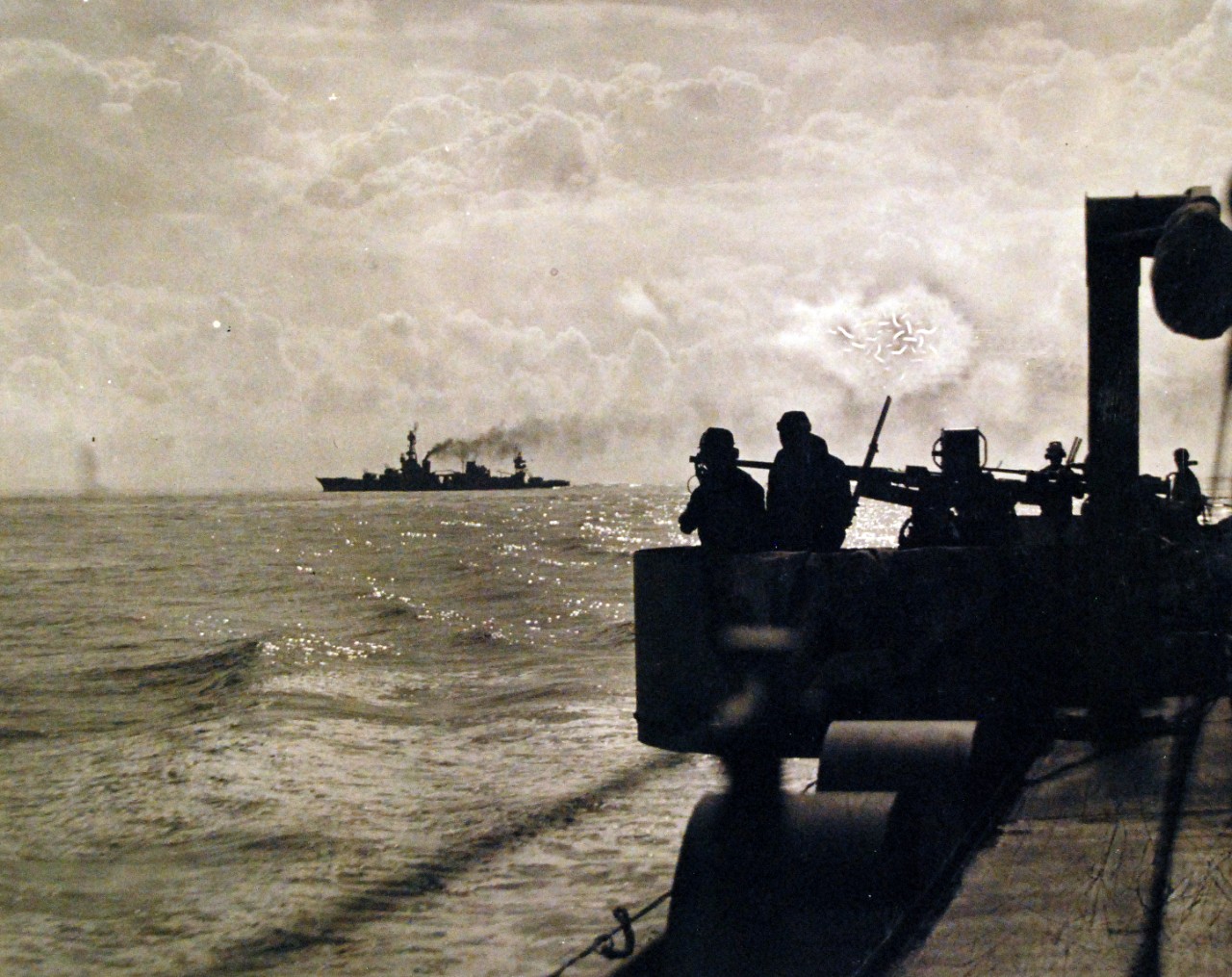 <p>80-G-30620: Battle of Santa Cruz Islands,&nbsp; 26 October 1942.&nbsp;&nbsp; Japanese plane, burning and smoking before crashing.&nbsp; Photograph by USS&nbsp;<i>San Juan</i>&nbsp;(CL 54).&nbsp;&nbsp;</p>

