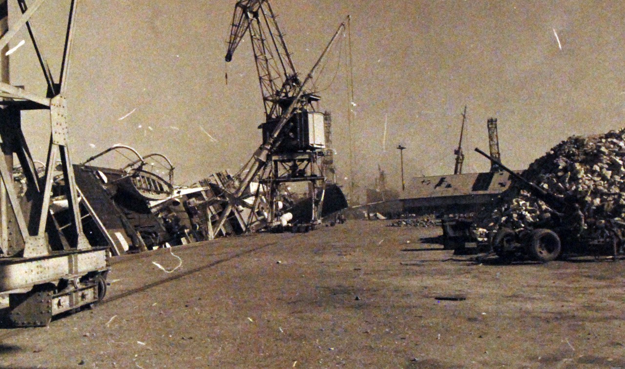 <p>80-G-19923: Operation Torch, November 1942. Damaged ships at Casablanca Harbor, Morocco, during the first days of the U.S. campaign in North Africa. French ship SS Porthos is shown damaged.&nbsp;</p>
