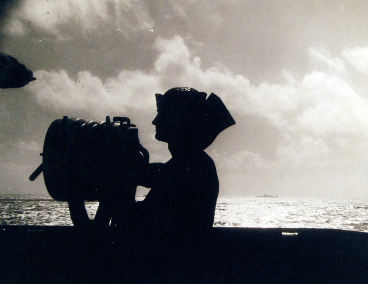 <p>80-G-38830: Naval Battle of Casablanca, 8-16 November 1942. Signalman silhouetted against the sky during the convoy to Casablanca.&nbsp;</p>
