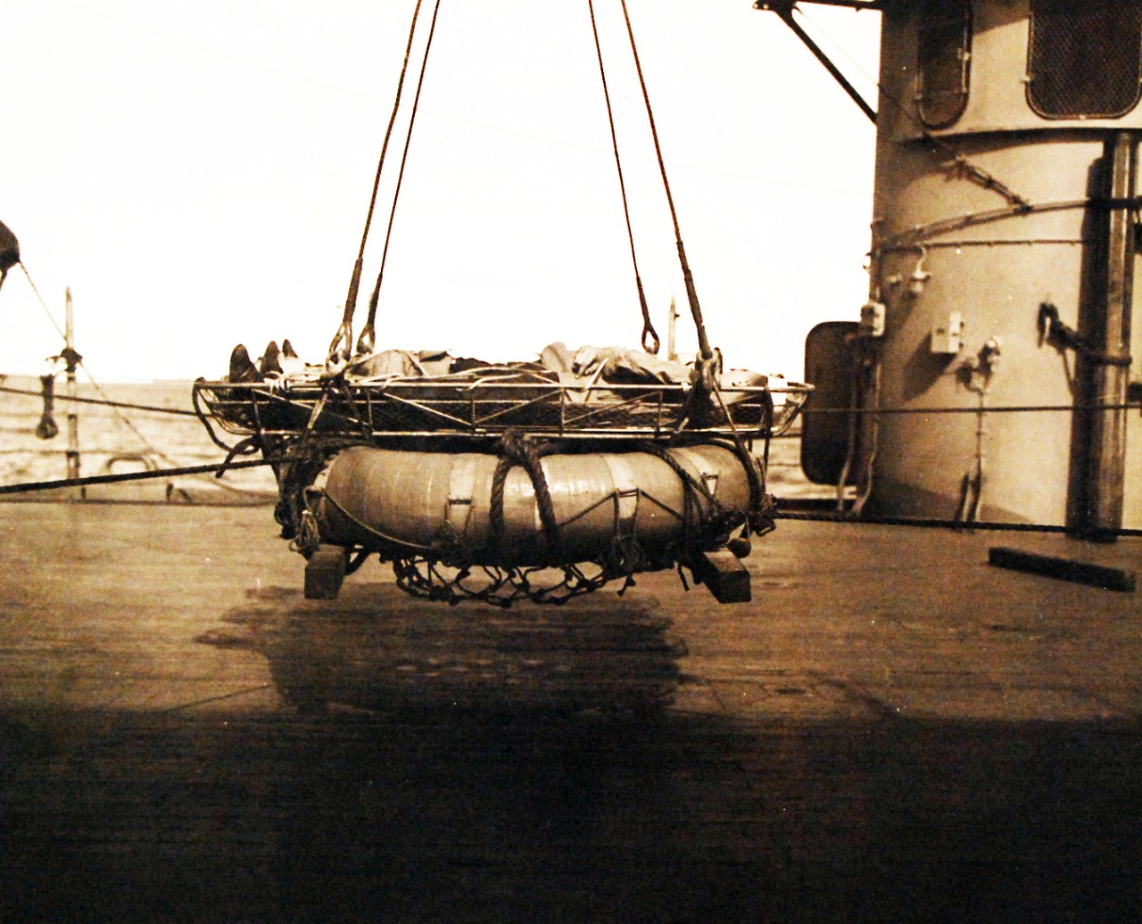 <p>80-G-30401: Operation Torch, November 1942. USS Augusta (CA 31). A special life raft litter, for removal of injured men in case of abandoning ship was rigged and demonstrated during the trip to North Africa.&nbsp;</p>
