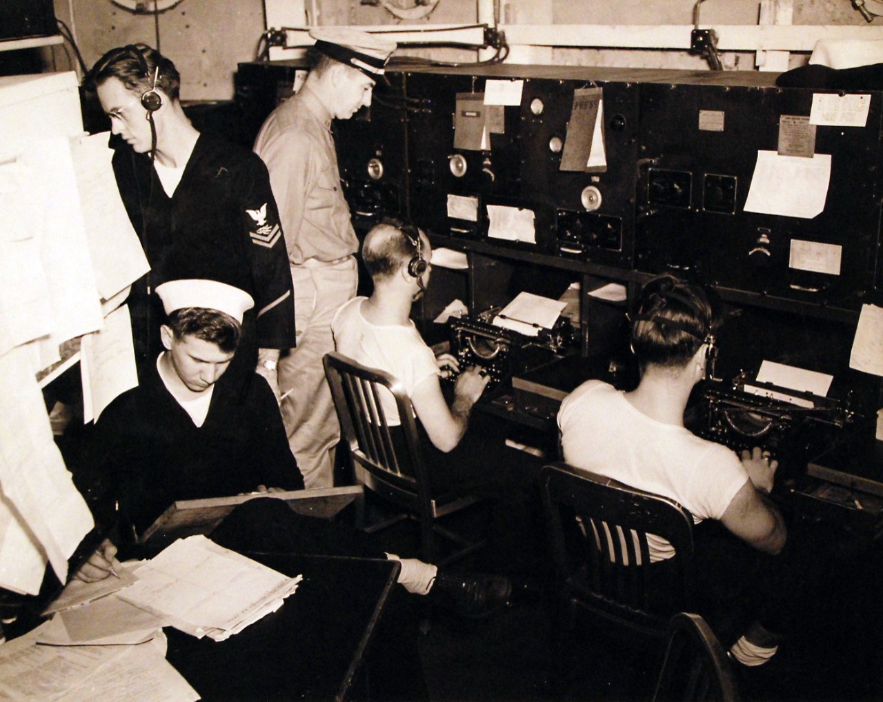 <p>80-G-30469: Operation Torch, November 1942. USS Augusta (CA 31). Radio communication and decoding received and sent messages aboard the cruiser while en-route to Morocco.&nbsp;</p>
