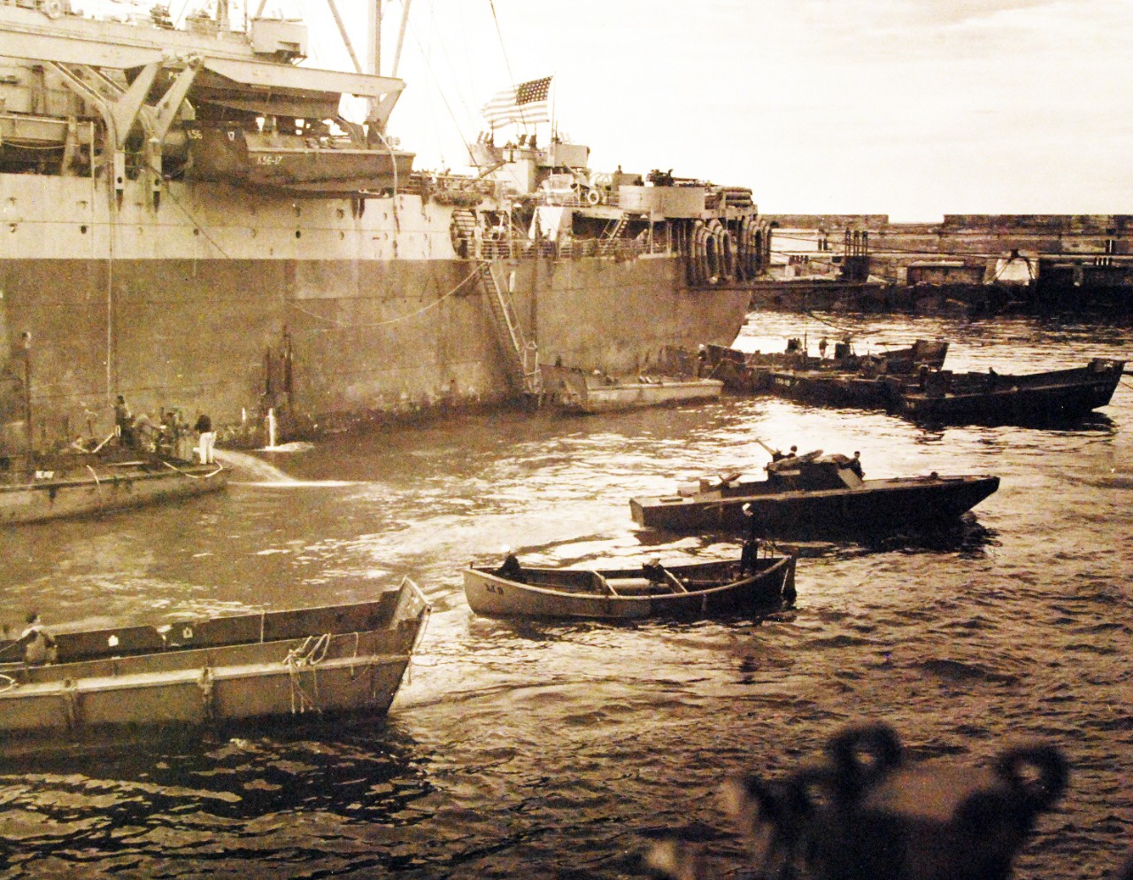 <p>80-G-30676: Operation Torch, November 1942. USS Harry Lee (AP 17), tank lighters and support craft at Casablanca, Morocco, during the campaign, November 13, 1942.&nbsp;</p>
