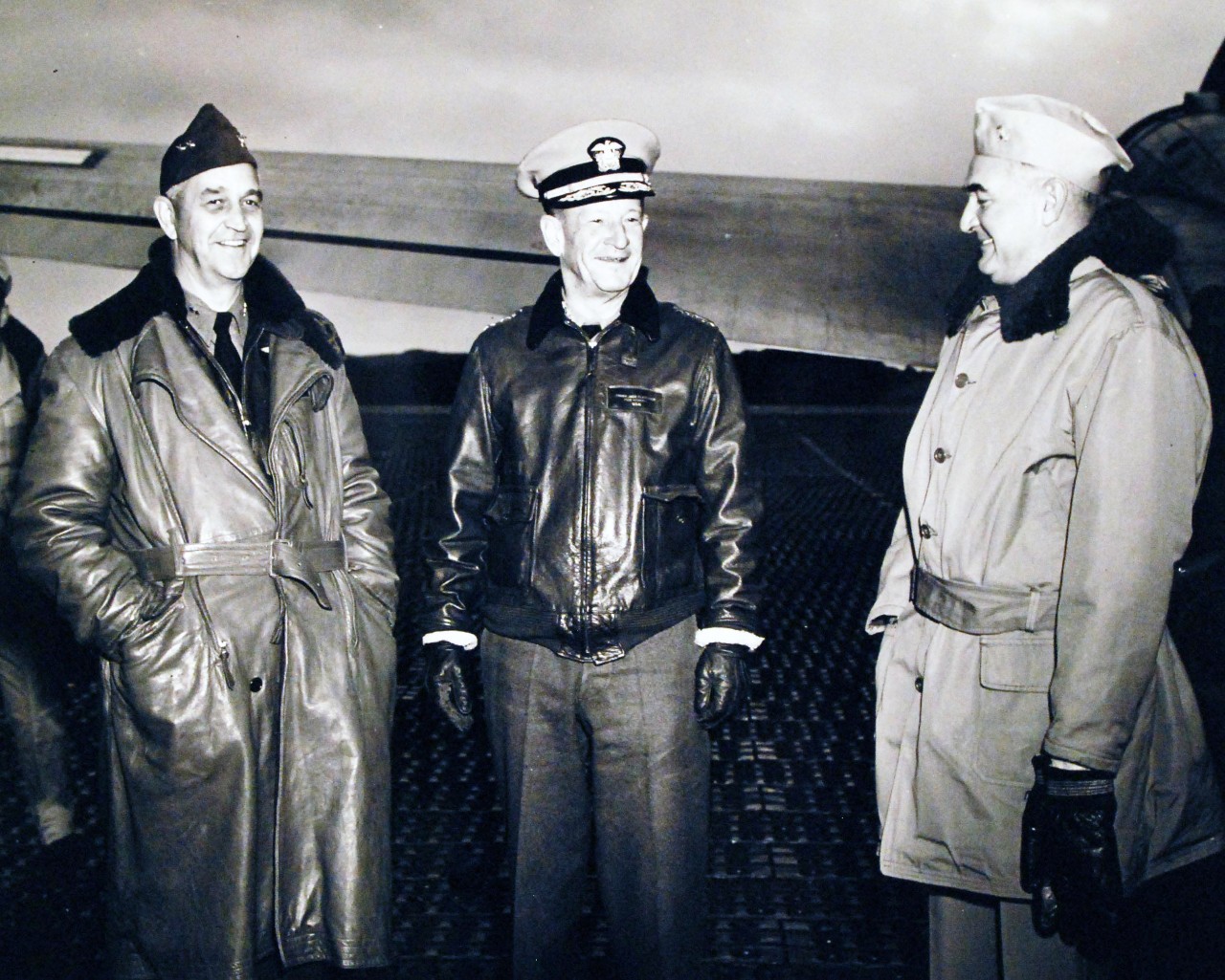 80-G-265229:     Attu Island, Alaska, October 1944.  Rear Admiral Ralph F. Wood, left, upon his arrival at Attu Islands in the Aleutian is met by Vice Admiral Frank J. Fletcher and an unidentified admiral, 11 October 1944.  Official U.S. Navy Photograph, now in the collections of the National Archives.   (2014/7/9).