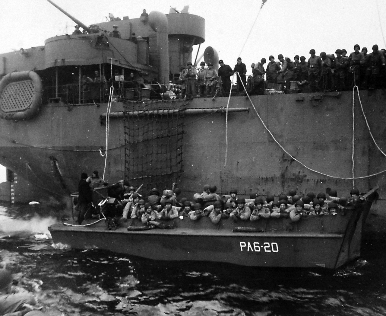 80-G-50788:   Aleutian Islands Campaign, June 1942 - August 1943.  Battle for Attu, May 1943.   Troops in landing boats alongside USS Heywood (APA-6) off Attu, Aleutian Islands, May 11th, 1943.   U.S. Navy Photograph, now in the collections of the National Archives.  (2016/05/10).