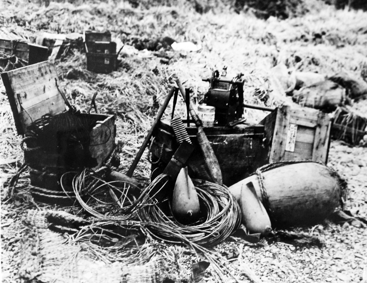 LC-Lot-803-32:  Aleutian Islands Campaign, June 1942 - August 1943.   Allied Landing on Attu Island, May 11 1943. Japanese Gear Fell Into American Hands.  Inland from shoreline of a small cove along the west of Massacre Bay, this Japanese gear was found at foot of valley where Japanese living quarters were located.  The type of material was reported to indicate a seaplane base had been planned by the Japanese.  U.S. Navy photograph, released May 29, 1943.   Photographed through Mylar sleeve.  Courtesy of the Library of Congress.  (2015/11/06).