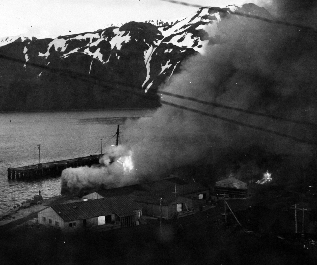 80-G-590:  Attack on Dutch Harbor,  Alaska,  June 1942.   SS Northwestern burning after a bomb it, 4 June 1942.  Official U.S. Navy Photograph, now in the collections of the National Archives.    (2014/5/29).