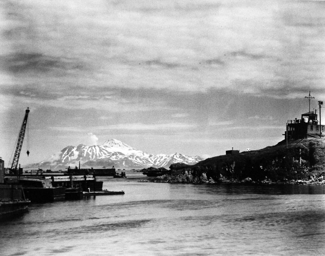 80-G-242070:      Adak, Alaska, July 1944.   Small boat basin at Adak, Alaska.  Great Sitkin Island in background.  Captain of Port Office extreme right.   Photographed on 26 July 1944.   Official U.S. Navy Photograph, now in the collections of the National Archives.  (2014/05/22). 
