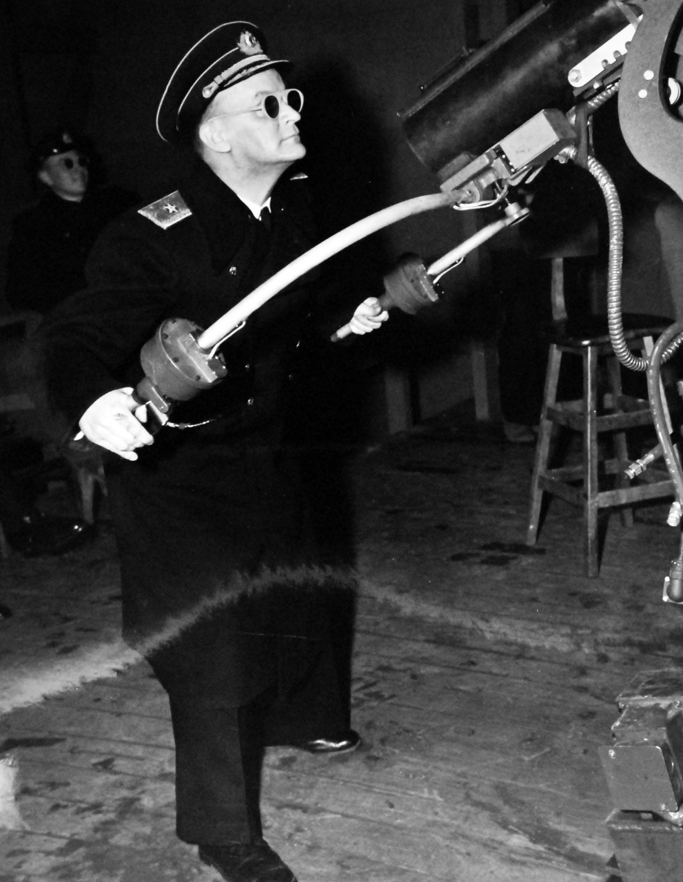 80-G-342179:  Naval Operating Base, Adak, Alaska, July 1945.   Soviet Rear Admiral Popov, firing the anti-aircraft gunnery trainer at NOB Adak, Alaska, 6 July 1945.    Official U.S. Navy Photograph, now in the collections of the National Archives.  (2013/08/21).  