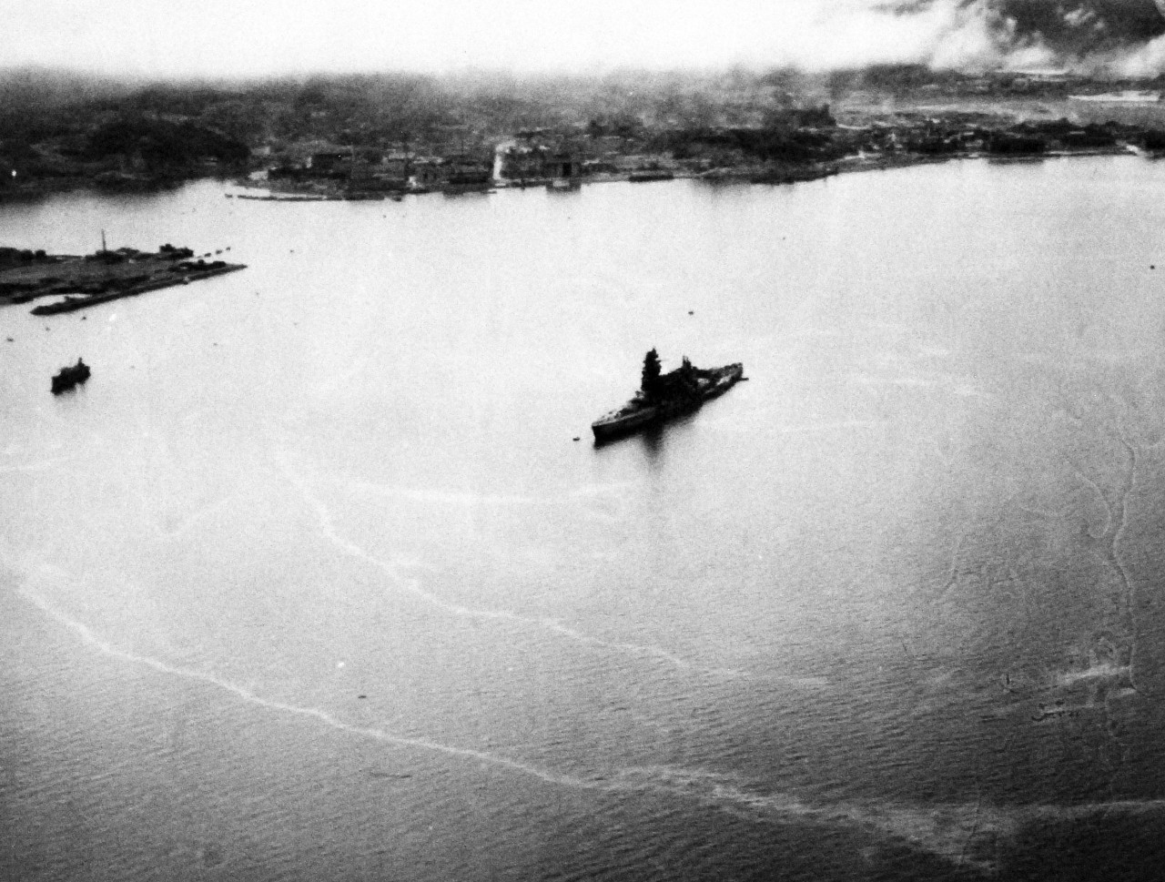 80-G-343773:  Japanese battleship Nagato, 1945.       The badly damaged Japanese battleship Nagato off Yokosuka Naval Air Station, Japan, as seen from plane of USS Shangri La (CV-38).    Photographed by Photographer’s Mate Second Class J. Guttoach, August 26, 1945.   Official U.S. Navy Photograph, now in the collections of the U.S. National Archives.   (2014/5/22). 
