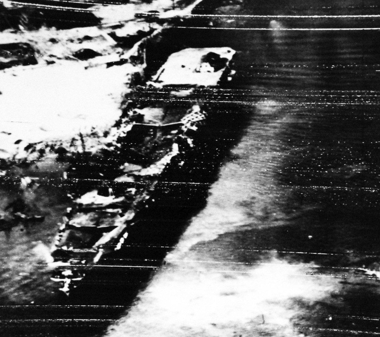 80-G-490169:   Raids on Japanese Home Islands, July 30, 1945.   Japanese carriers of the Amagi-Katsuragi class hit by bombers at Kure Bay, Japan.  Radio photograph, July 30, 1945.    U.S. Navy Photograph, now in the collections of the National Archives. (2015/12/08). 