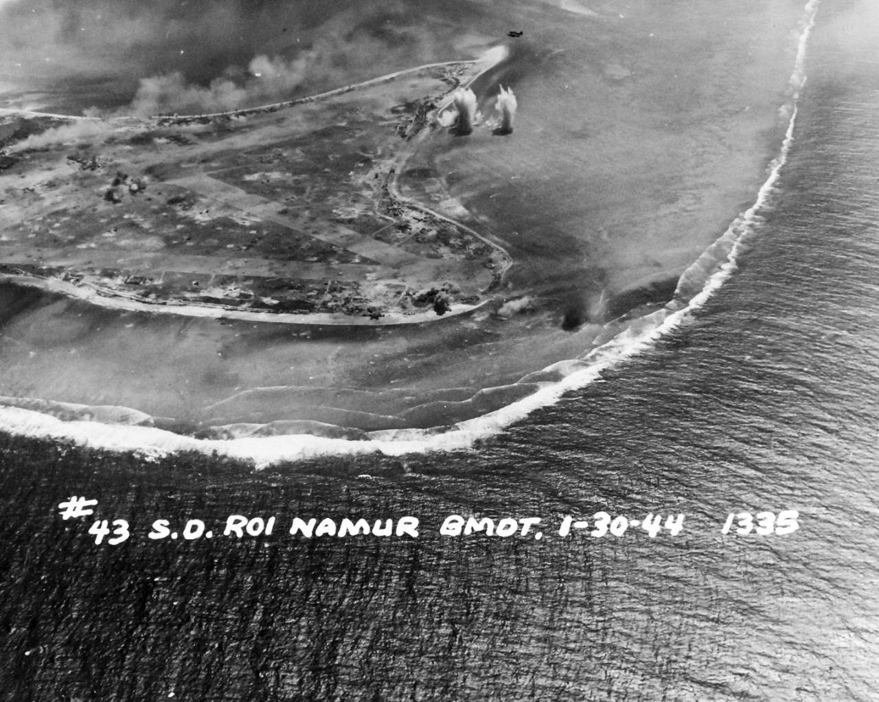 80-G-227921:  Pre-Raid Bombardent of Kwalajein, January 30, 1944.   Roi and Namur Island, Marshall Islands.   Bombardment preceding the invasion on the following day.   Photographed by plane from USS South Dakota (BB-57).    Official U.S. Navy Photograph, now in the collections of the National Archives.   (2018/02/28).  