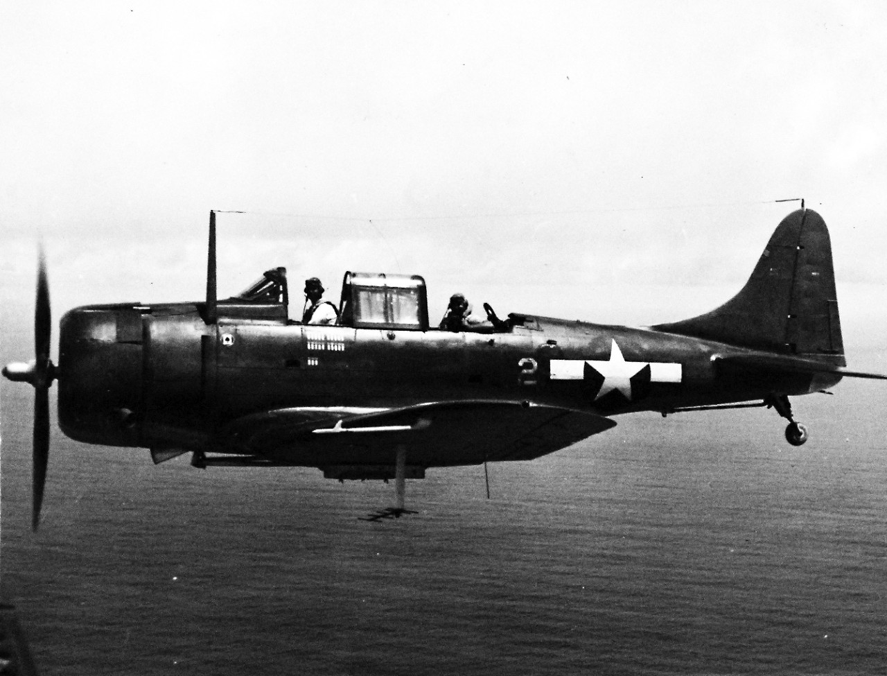 80-G-234791:  SBD-5 over Majuro Atoll, 1944.   Aircraft was from USS Lexington (CV-16).    Photograph released May 13, 944.  Aircraft was piloted by Captain Bell, USMC, VMSB 231 and was carrying a Navy photographer.      Official U.S. Navy photograph, now in the collections of the National Archives.  (2016/11/15).