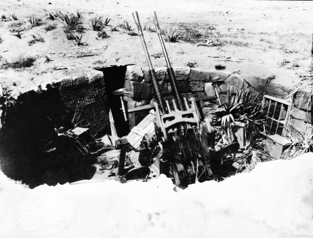 127-GW-304-143496:  Battle for Iwo Jima, February-March 1945.   Twin-mount 25mm anti-aircraft guns in emplacement.  Photographed by Kauffman, March 1945. Official U.S. Marine Corps photograph, now in the collections of the National Archives.  (2016/02/17).