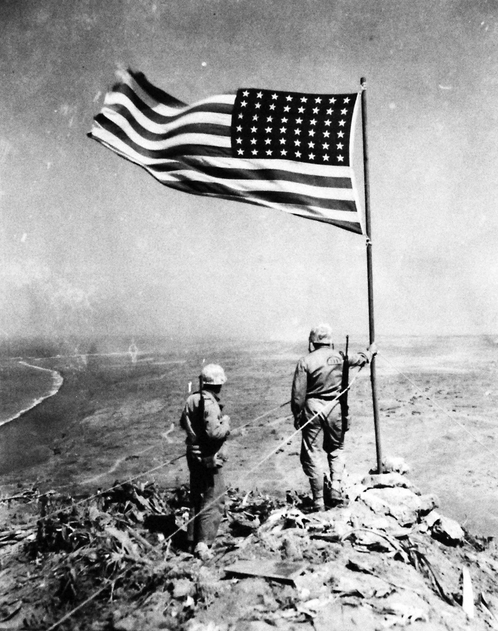 127-GW-319-142858:    Iwo Jima Operations,  February 1945.   View to Northwest from Mount Suribachi, photographed by Kauffman, 1945.  Official U.S. Marine Corps Photograph, now in the collections of the National Archives.  (2016/09/06).