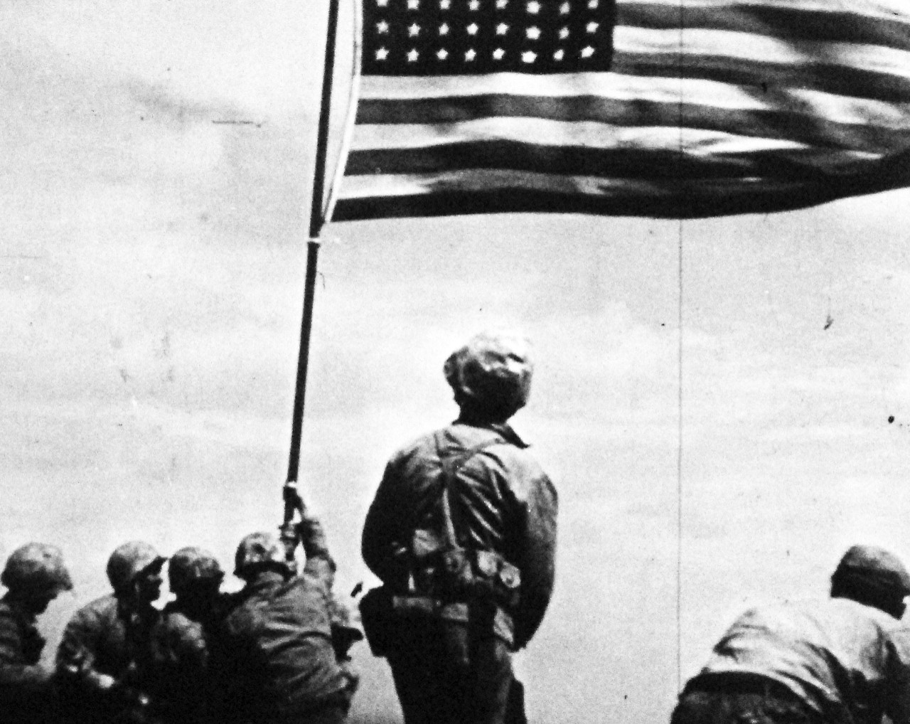 127-GW-319-146246:  Iwo Jima Operations, February 1945.  Iwo Jima Flag Raising on Mt. Suribachi.  Photographed by Dick, copied on October 3, 1946.     Official U.S. Marine Corps Photograph, now in the collections of the National Archives.  (2016/09/06).