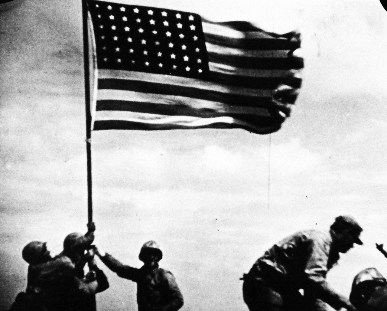 127-GW-319-146247: Iwo Jima Operations, February 1945.  Iwo Jima Flag Raisin on Mt. Suribachi.  Photographed by Dick, copied on October 3, 1946.     Official U.S. Marine Corps Photograph, now in the collections of the National Archives.  (2016/09/06).
