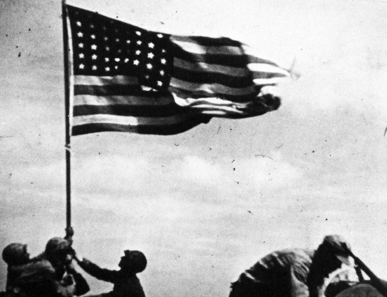 127-GW-319-146244:   Iwo Jima Operations, February 1945.  Iwo Jima Flag Raising on Mt. Suribachi.  Photographed by Dick, copied on October 3, 1946.     Official U.S. Marine Corps Photograph, now in the collections of the National Archives.  (2016/09/06).