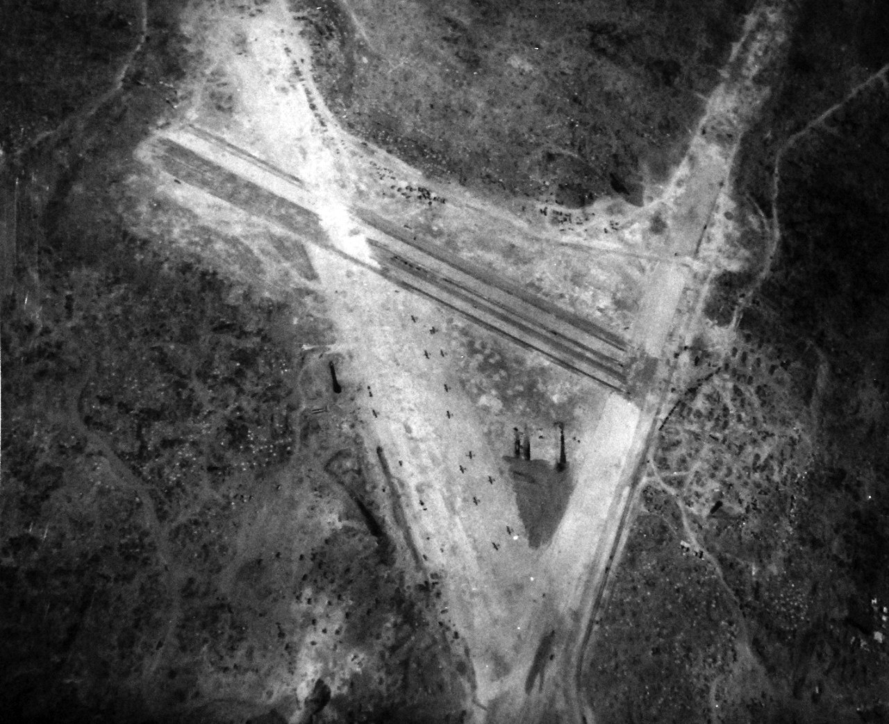 80-G-339207: Battle for Iwo Jima, February-March 1945.  Bomb craters on Iwo Jima Volcano Island caused by bombs of VC-92.  Photographed by K-20, March 1, 1945.    Official U.S. Navy Photograph, now in the collections of the National Archives.  (2016/11/09). 