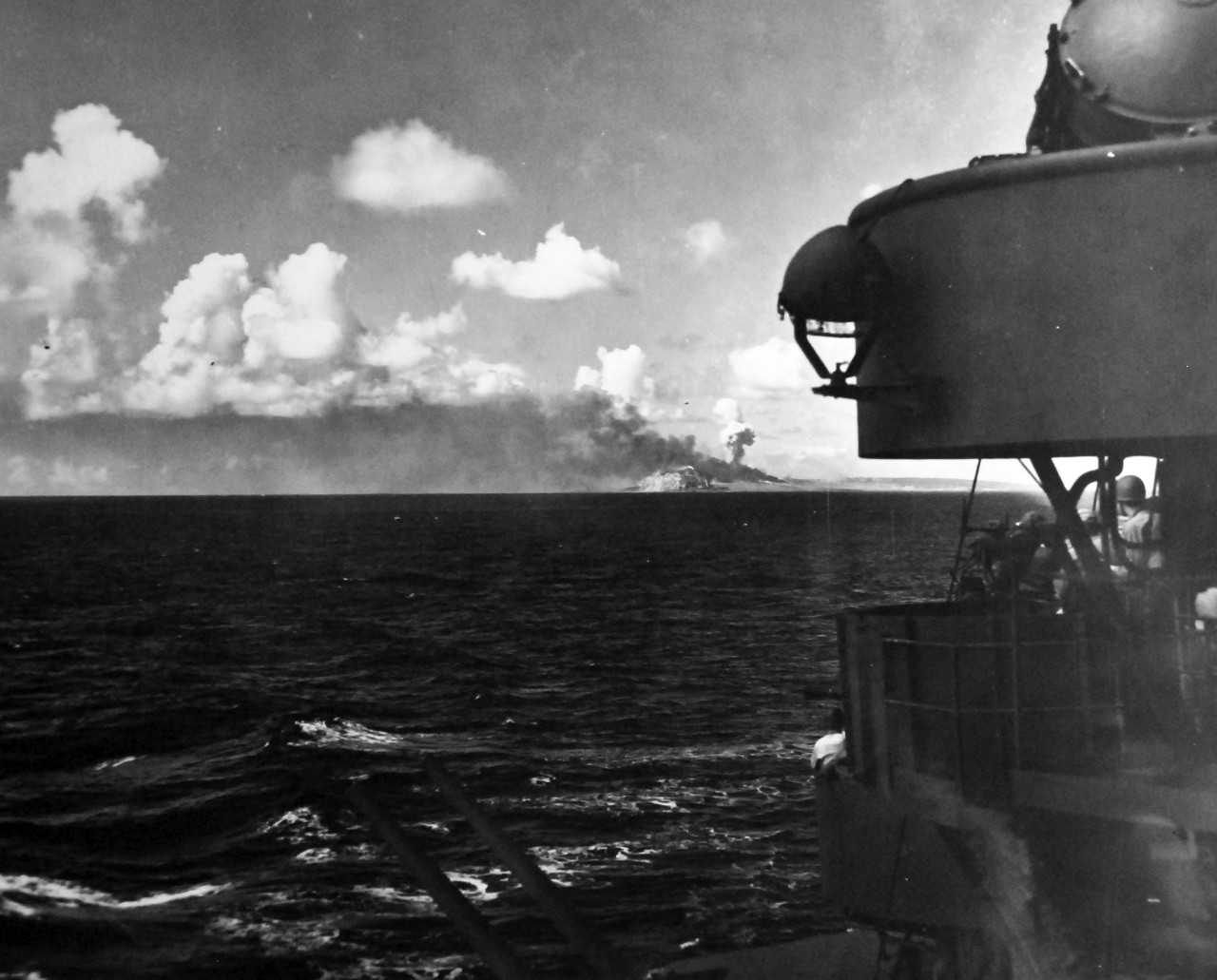 80-G-342247:  Battle for Iwo Jima, February-March 1945.  Bombardment of Iwo Jima, prior to the U.S. Marine invasion.  Mount Suribachi is in the foreground.   Photograph received 27 July 1945.  Official U.S. Navy Photograph, now in the collections of the National Archives.  (2013/08/14).  
