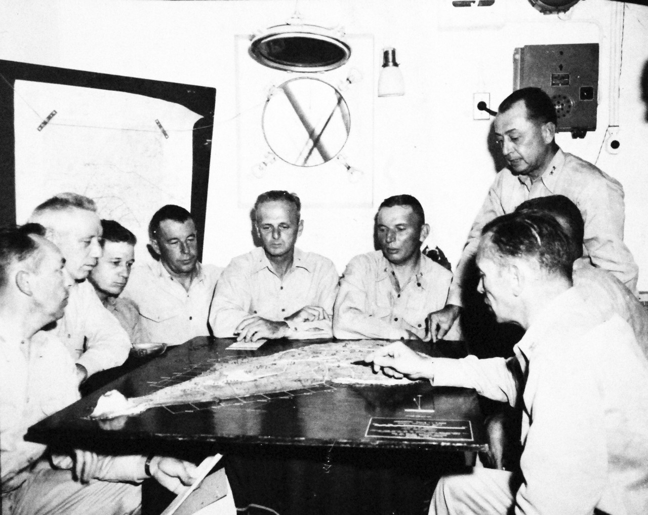 127-GW-302-142479:  Battle for Iwo Jima, February-March 1945.   General Clifton B. Cates with executive staff and regiment commanders in final conference aboard ship.  Photographed by Morejohn, 1945.  Official U.S. Marine Corps photograph, now in the collections of the National Archives.  (2016/02/17).