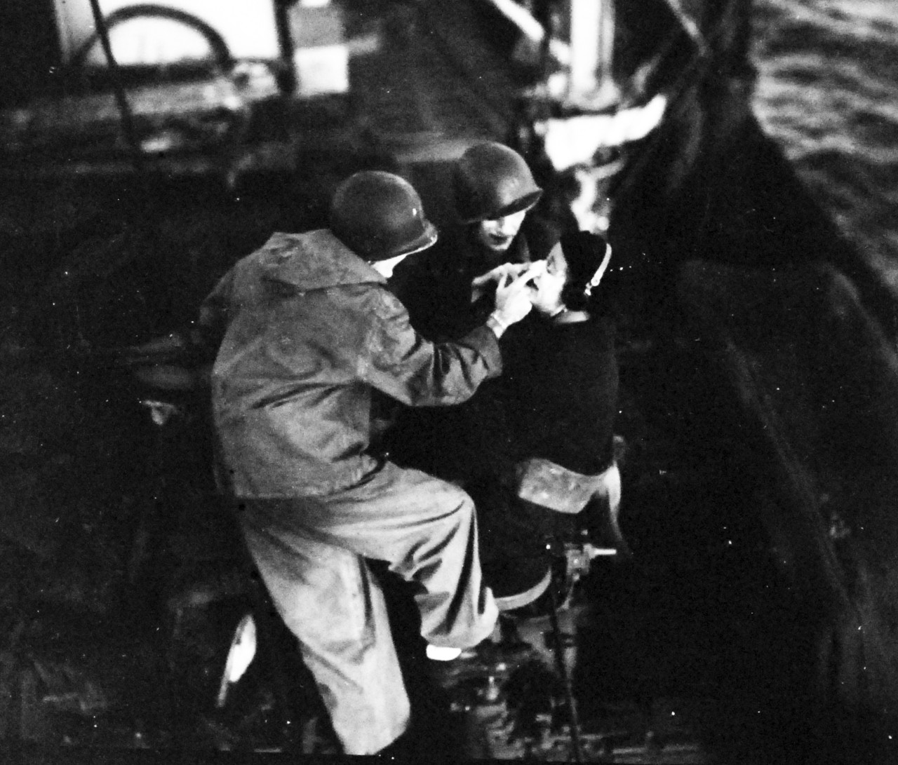 80-G-304993:  Battle for Iwo Jima, February-March 1945.  Men onboard USS Heywood L. Edwards (DD-663) with make-up for flash protection while en-route to Iwo Jima.   Official U.S. Navy photograph, now in the collections of the National Archives.  (2016/09/06).