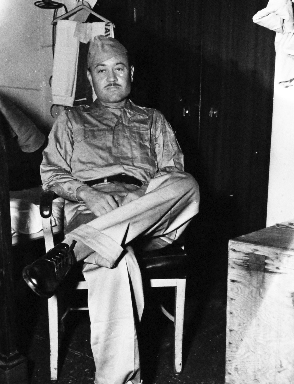 80-G-344571:  Allied Prisoners of War, 1945.  Major Gregory “Pappy” Boyington, USMC, who was reported killed in China and was held as a Prisoner of War by the Japanese and complained of severe beatings with baseball bats and slugging on various occasions.   Boyington later received the Medal of Honor for his aviation achievements prior to be taken prisoner.  Photograph release September 24, 1945.  Official U.S. Navy photograph, now in the collections of the National Archives.   (2015/11/24).