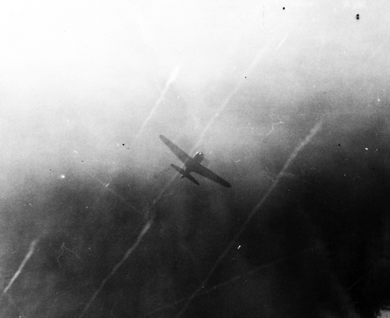 80-G-270673:  Battle off Samar, Japanese Kamikaze, October 25, 1944.    Japanese suicide “Zero” coming in for dive on USS Suwannee (CVL-27) off Leyte Gulf.  This attack was the second one of the day.   Official U.S. Navy Photograph, now in the collections of the National Archives.   (2014/4/24). 