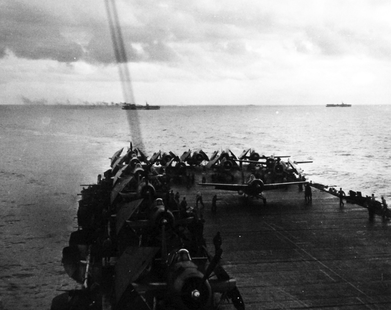 80-G-287425:   Battle off Samar, October 25, 1944.   USS Kitkun Bay (CVE 71) launches “Avengers” to engage Japanese fleet during the Battle of Leyte Gulf.  Official U.S. Navy Photograph, now in the collections of the National Archives.   (2014/5/15).  