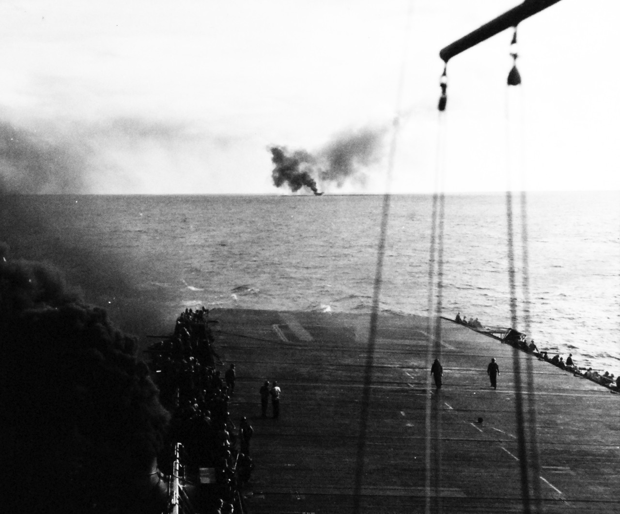 80-G-287446:   Battle off Samar, October 25, 1944.     Salvos from ships of Japanese fleet moving toward Philippines fall wide of mark on carrier-escort during Battle of Leyte Gulf, taken from USS Kitkun Bay (CVE-71), 25 October 1944.   Taken from astern of CVE.  Official U.S. Navy Photograph, now in the collections of the National Archives.  (2014/5/15).  