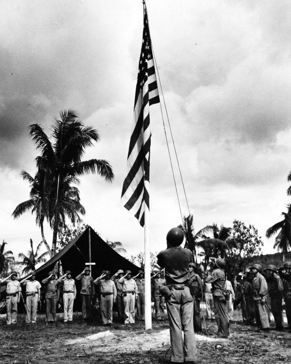 80-G-239310:    Invasion of Guam, July 21-August 10, 1944     Rear Admiral Richard L. Conolly, USN, Commander of Naval Amphibious Operations for the Guam invasion and on his left, Marine Major General Roy S. Geiger, 3rd Amphibious Corps, Commanding General, saluting the first American flag officially raised on Guam, July 27, 1944.  The photograph was released on  August 5, 1944.    Official U.S. Navy Photograph, now in the collections of the National Archives.  (2017/03/07).