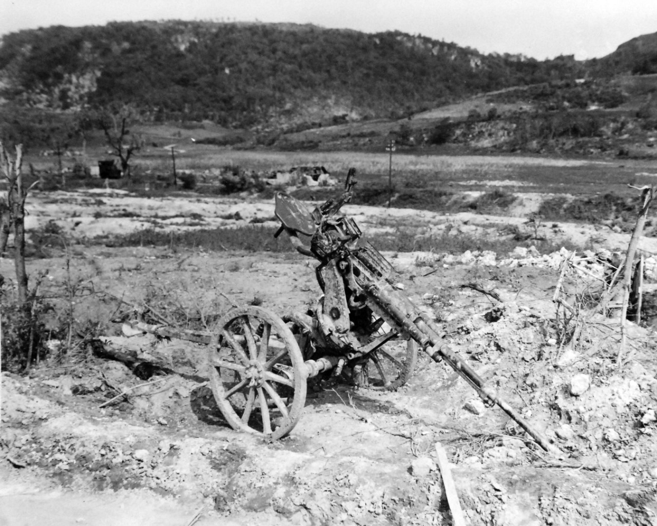 80-G-307848:  Invasion of Saipan, June-July 1944.  Japanese guns captured on Saipan after U.S. Invasion.   Shown:  50 cal. Photograph received March 20, 1945.      Official U.S. Navy Photograph, now in the collections of the U.S. Navy.  (2017/04/11).  