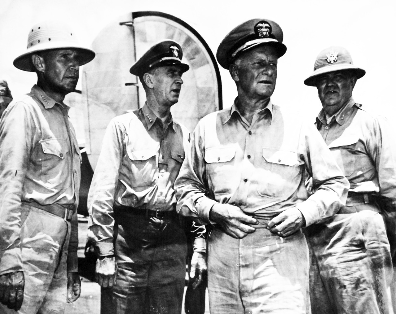 80-G-307861:  Invasion of Saipan, June-July 1944.  Admiral Ernest J. King (second to left) with (left to right): Vice Admiral Raymond A. Spruance, USN; Admiral Chester W. Nimitz, USN; and Brigadier General Sanderford Jarman on a visit. Photograph received March 20, 1945.      Official U.S. Navy Photograph, now in the collections of the U.S. Navy.  (2017/04/11).  