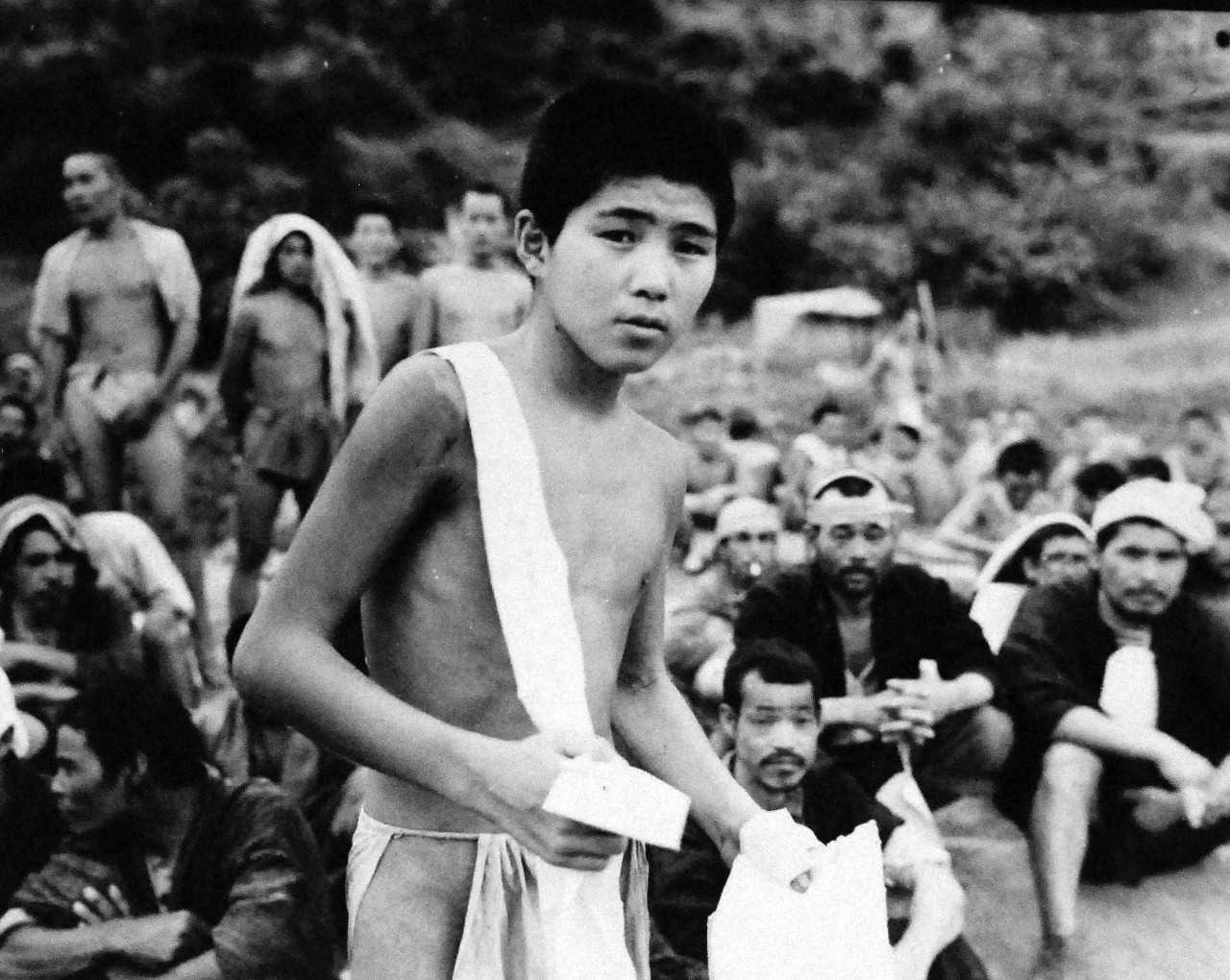 127-GW-666-128008:   Okinawa Campaign, April-June 1945.   Japanese captured by Sixth Marine Division on Okinawa.  Photographed by Staff Sergeant Connolly,  June 21, 1945.  Official U.S. Marine Photograph, now in the collection of the National Archives.  (2014/7/23). 