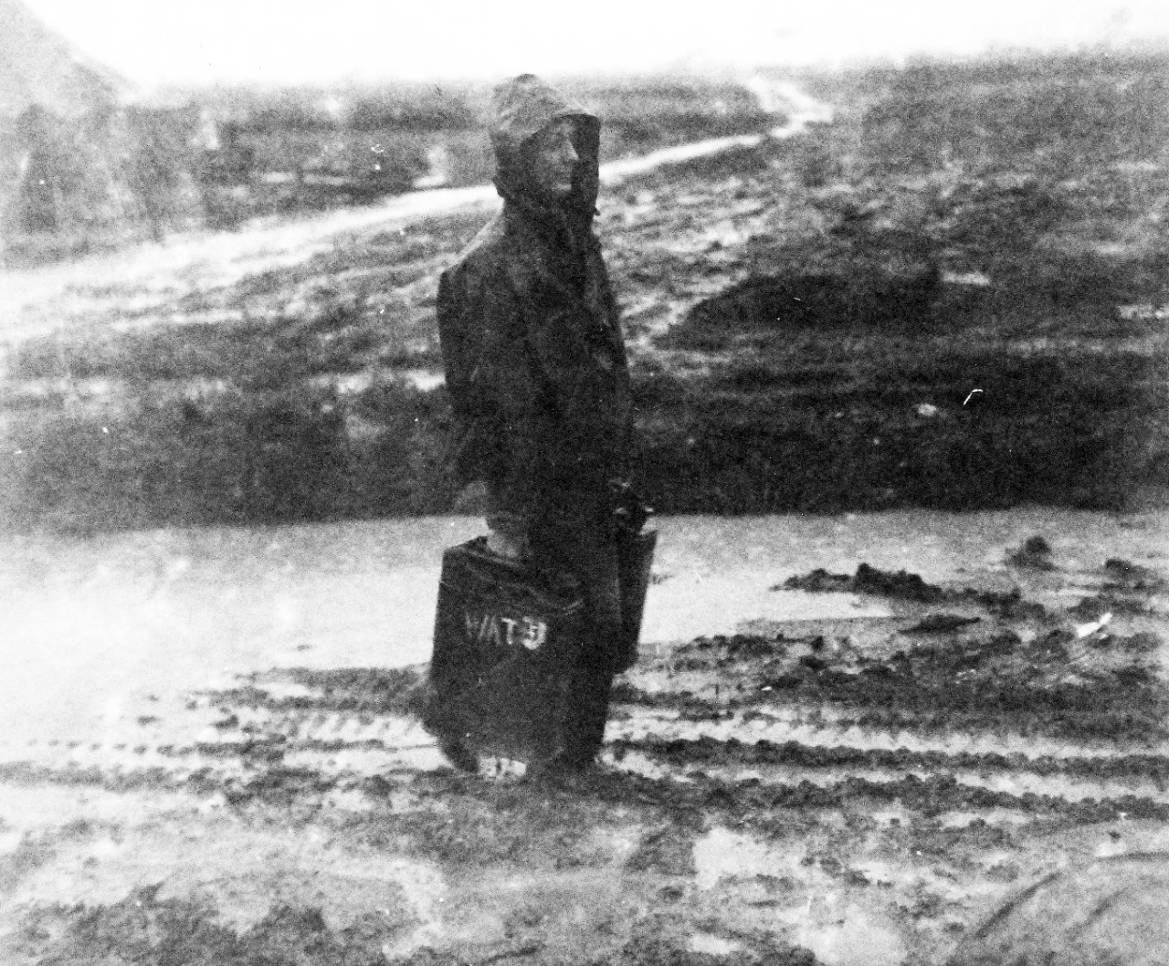 80-G-373431:   Okinawa Campaign, April-June 1945.  Marine Aviation Group Thirty-Three (MAG-33) Headquarters under flooded condition at Okinawa, Ryukyu Islands, May 24, 1945.  Official U.S. Navy Photograph, now in the collections of the National Archives. (2015/12/08).