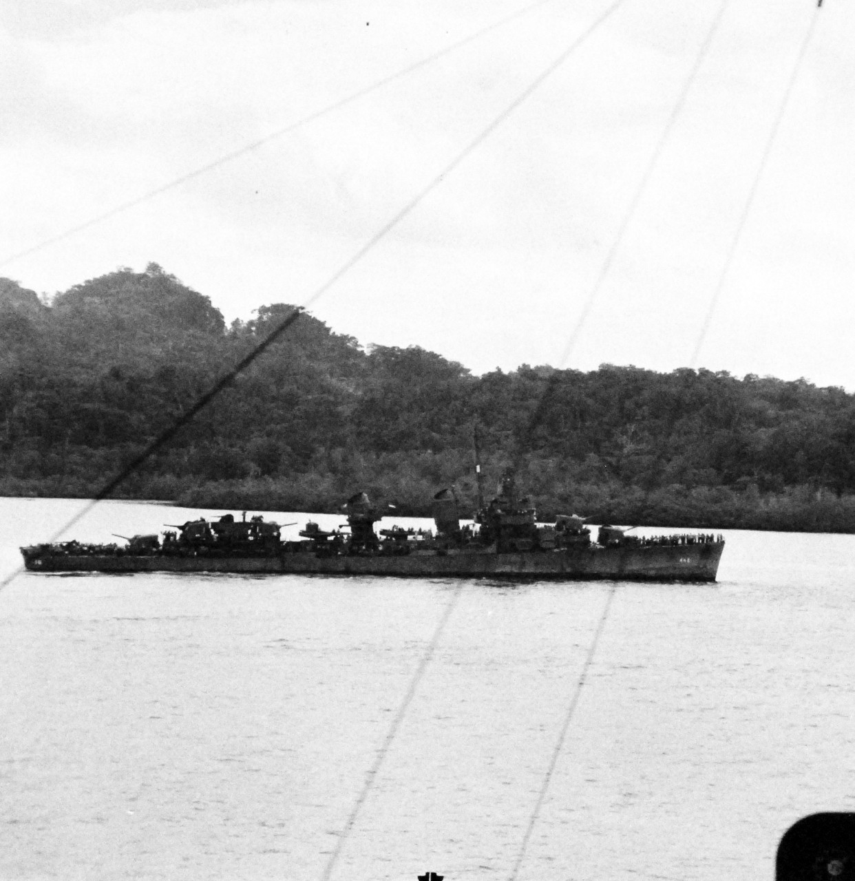 80-G-258899:  Battle of Kula Gulf, July 5-6, 1943.     USS Radford (DD-446) return to Tulagi from first battle of Kula Gulf with survivors of USS Helena (CL-50).    U.S. Navy photograph, now in the collections of the National Archives.  (2017/02/21).  