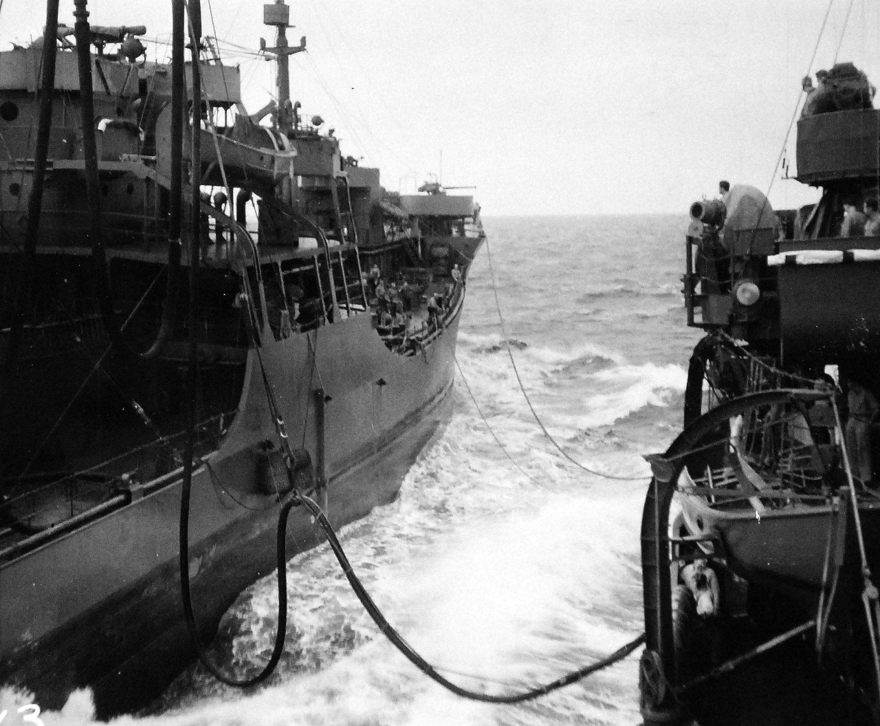 80-G-55505:  USS Sabine (AO-25) engaged in refueling operations underway in heavy seas during the Battle of Kula Gulf, 5-6 July 1943.   Photographed by CPU-2.    Official U.S. Navy Photograph, now in the collections of the National Archives.  (2015/4/28). 