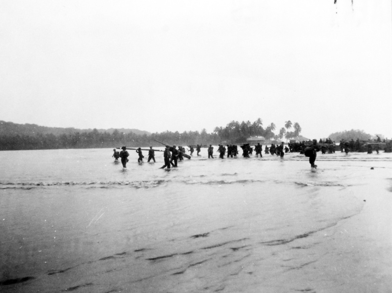 80-G-52578:  Rendova Island Invasion, June 30, 1943.   Men going ashore on Rendova Island, Solomon Islands, during beginning of invasion.   Official U.S. Navy Photograph, now in the collections of the National Archives.  (2018/04/04).