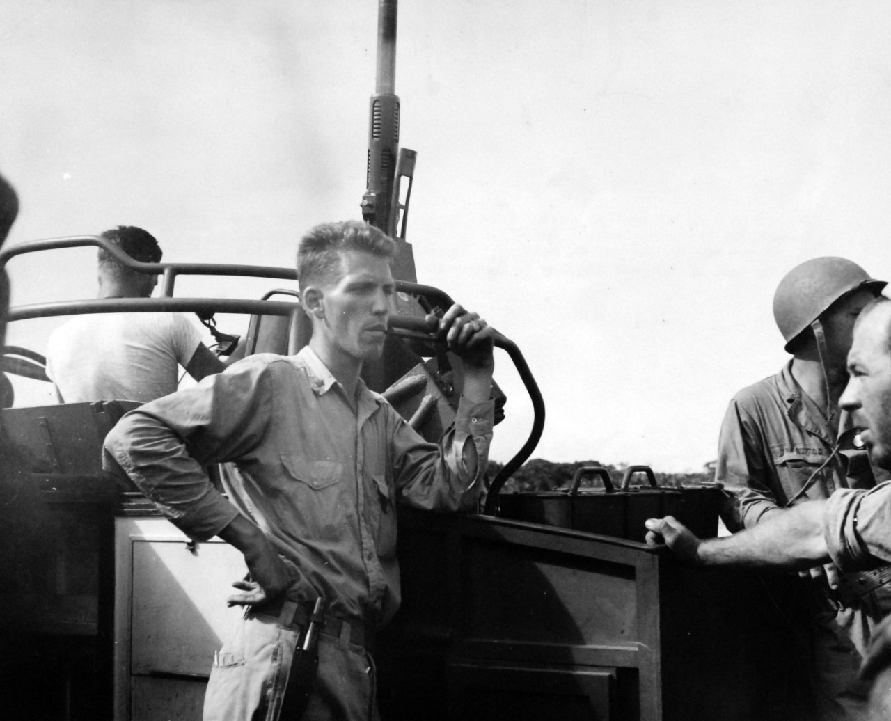 80-G-52599:  Rendova Island Invasion, June 30, 1943.   Lieutenant Commander Robert B Kelly, USN, of “They Were Expendable” fame on USS PT 153 during the invasion.     Official U.S. Navy Photograph, now in the collections of the National Archives.  (2018/04/04).
