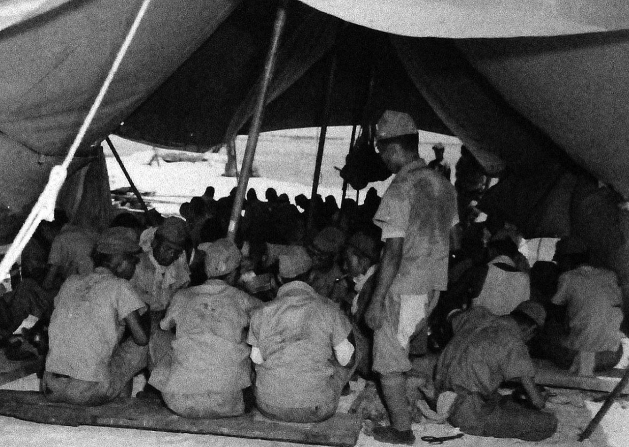 80-G-346795:   Surrender of Wake Island, September  1945.   Japanese prisoners of war are shown while having lunch.   U.S. Navy photograph, now in the collections of the National Archives.    (2013/6/12).