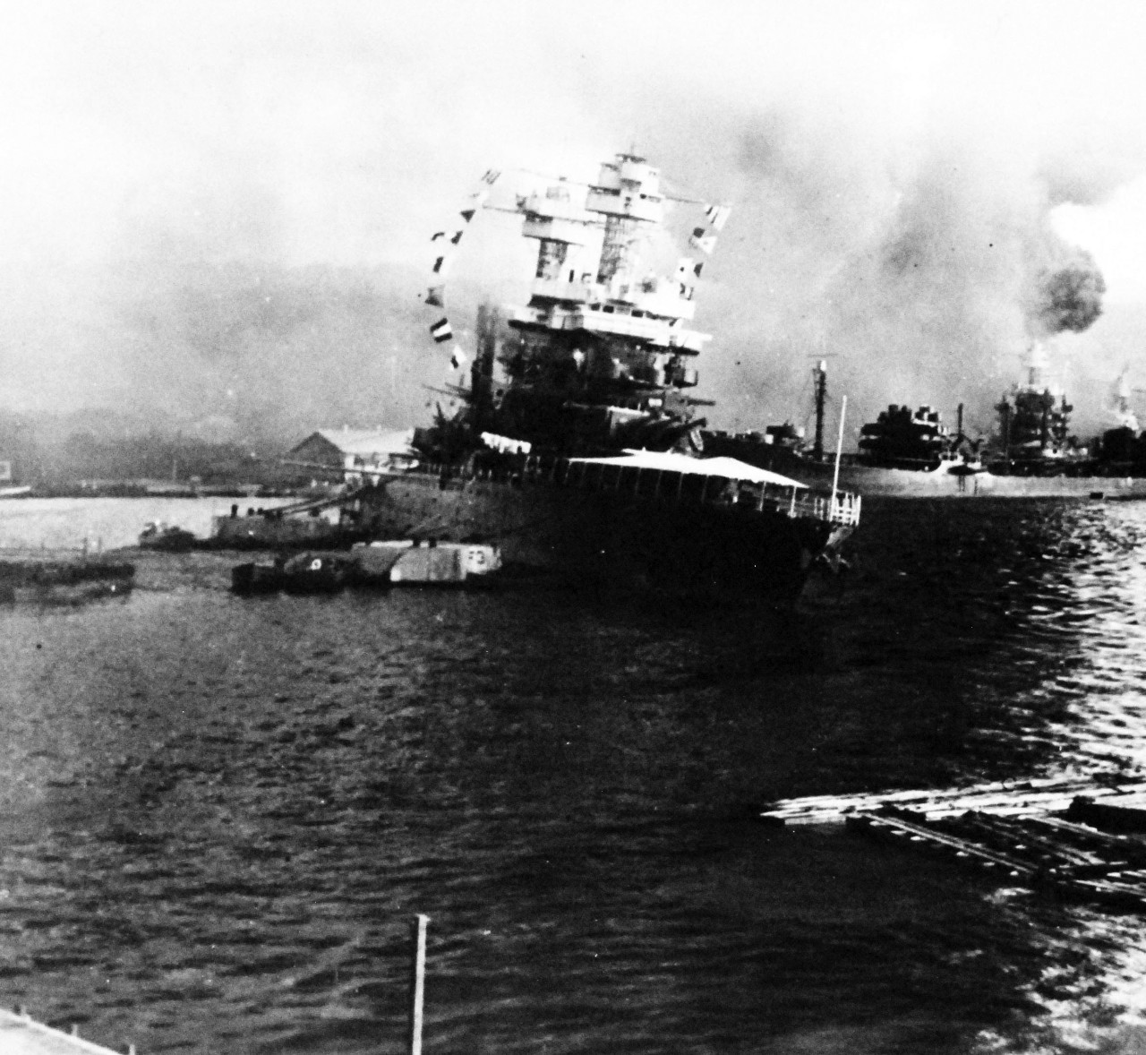 80-G-20047:   Japanese Attack on Pearl Harbor, Territory of Hawaii, December 7, 1941.   USS California (BB 44) is shown listing.  Official U.S. Navy Photograph, now in the collections of the National Archives. (4/7/2015).