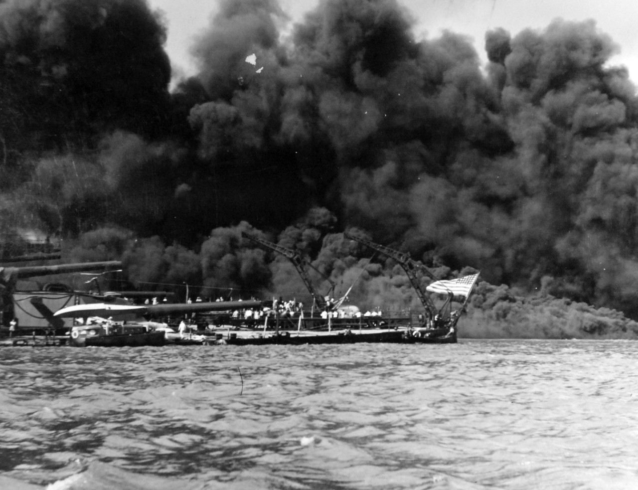 80-G-32754:   Japanese Attack on Pearl Harbor, December 7, 1941.  USS West Virginia (BB 48) is shown after the attack. Official U.S. Navy photograph, now in the collections of the National Archives.  (9/9/2015).