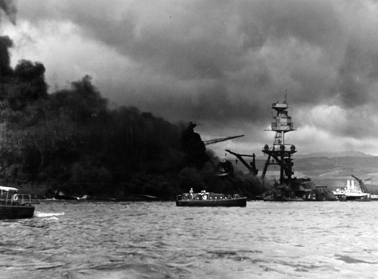 80-G-32755:   Japanese Attack on Pearl Harbor, December 7, 1941.  USS Arizona (BB 39) and West Virginia (BB 48) shown burning after the attack. Official U.S. Navy photograph, now in the collections of the National Archives. (9/9/2015).