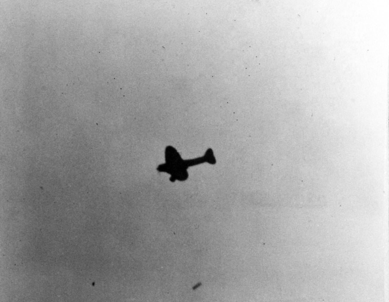 80-G-32907:   Japanese Attack on Pearl Harbor, December 7, 1941.  Japanese Navy Type 99 Carrier Bomber, an Aichi D3A “VAL” drops a 250 kilogram bomb during the attack. U.S. Navy photograph, now in the collections of the National Archives.        (8/27/2013).