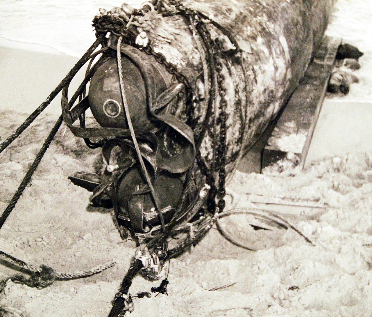 80-G-32686: HA-19. (Japanese "Type A" midget submarine).  Beached in eastern Oahu, after it unsuccessfully attempted to enter Pearl Harbor during the attack. The photograph was taken on or shortly after 8 December 1941. Official U.S. Navy photograph, now in the collections of the National Archives. (7/2/2014).