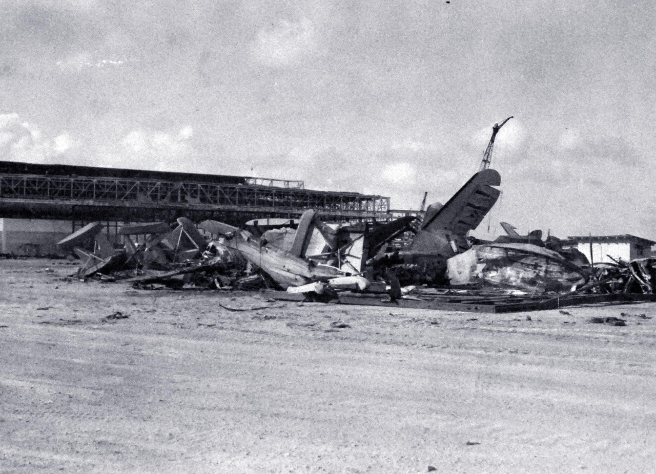 80-G-77603:   Japanese Attack on Pearl Harbor Attack, 7 December 1941   Damage sustained to aircraft after the Japanese Attack.  Location:  Naval Air Station, Kaneohe Bay, Oahu. U.S. Navy photograph, now in the collections of the National Archives.     (3/4/2015)