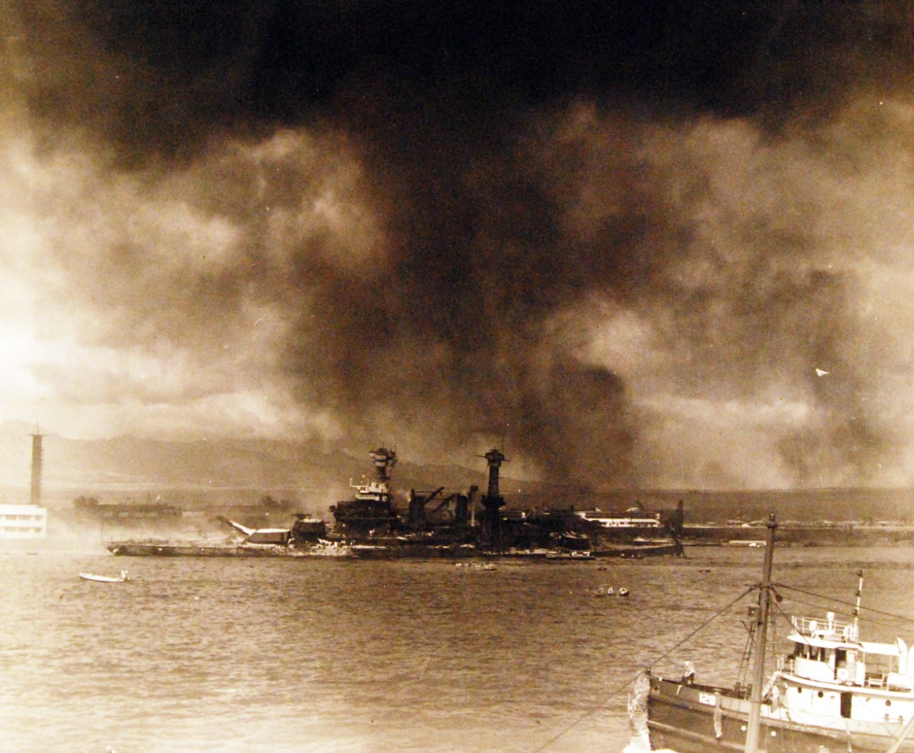 80-G-32774:   Japanese Attack on Pearl Harbor, December 7, 1941.   Ships burning after the attack. Official U.S. Navy photograph, now in the collections of the National Archives. (9/9/2015).