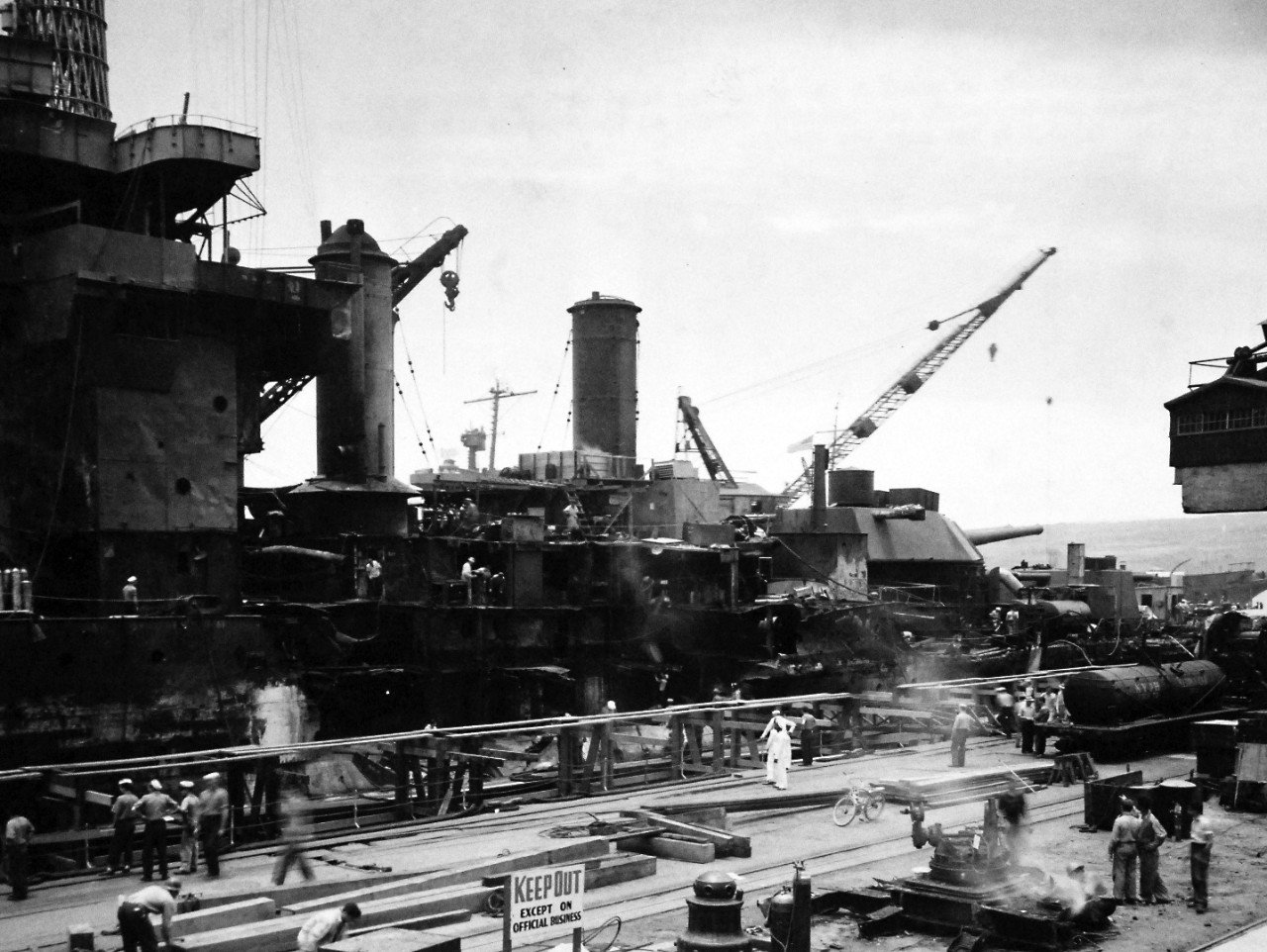 80-G-41614:  Pearl Harbor Attack, December 7, 1941USS West Virginia (BB 48) severely damaged in the Japanese Attack of December 7, 1941.  Shown:  Damage to her side is visible.  Photograph released May 23, 1943.  Official U.S. Navy Photograph, now in the collections of the National Archives. (2016/10/11).